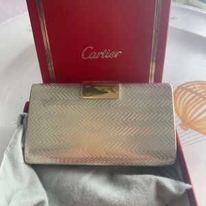 Vintage Cartier evening bag. Silver with an 18k gold clasp
